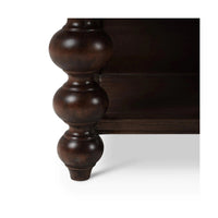 Close-up of kitchen island leg and floor.