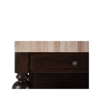 Close-up of kitchen island drawer and knob.