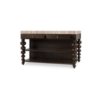 Angled view of dark kitchen island and shelves.