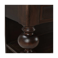 Detailed view of bobbin leg design on island.