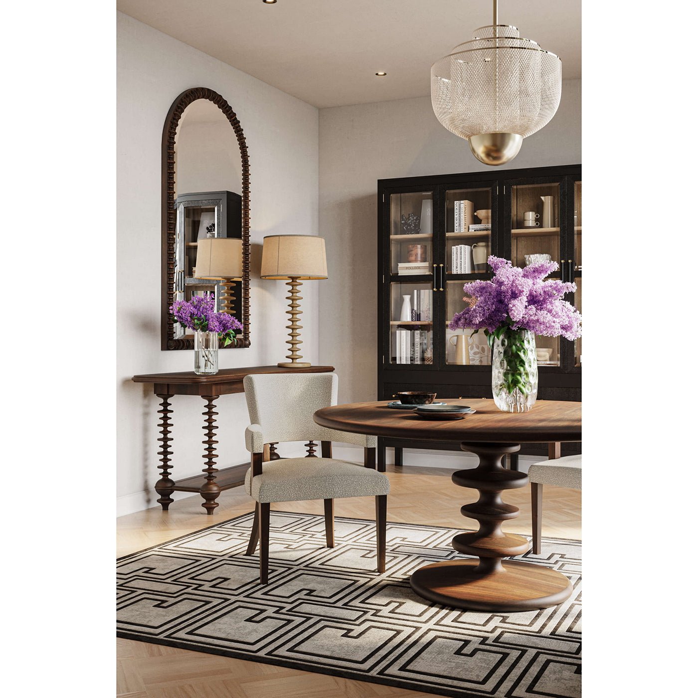 Console table in dining room with mirror and chairs.