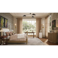 Console table in bedroom setup with elegant decor.