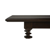 Close-up of console table corner with bobbin leg detail.