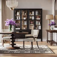 Dining room featuring console table and display cabinet.