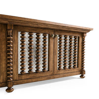 Angled front view of entertainment console doors.
