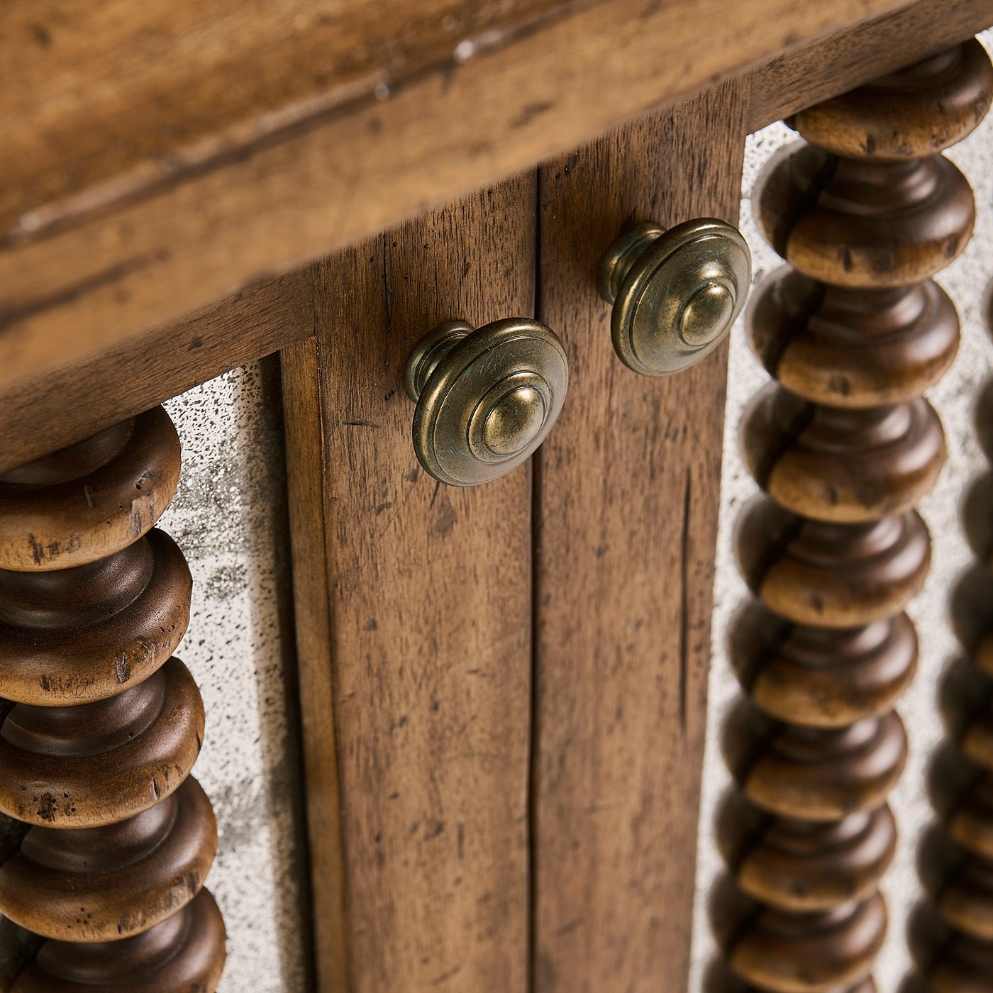 Close-up of console door handles and spindle detailing.