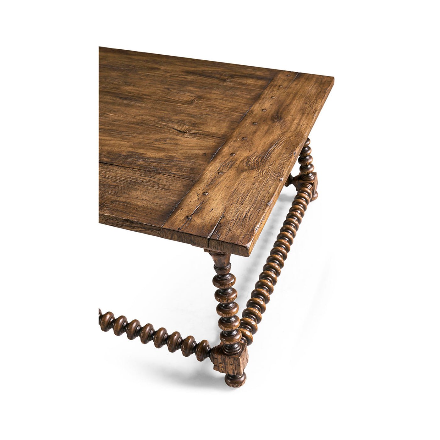 Close-up of rustic coffee table corner and leg detail.