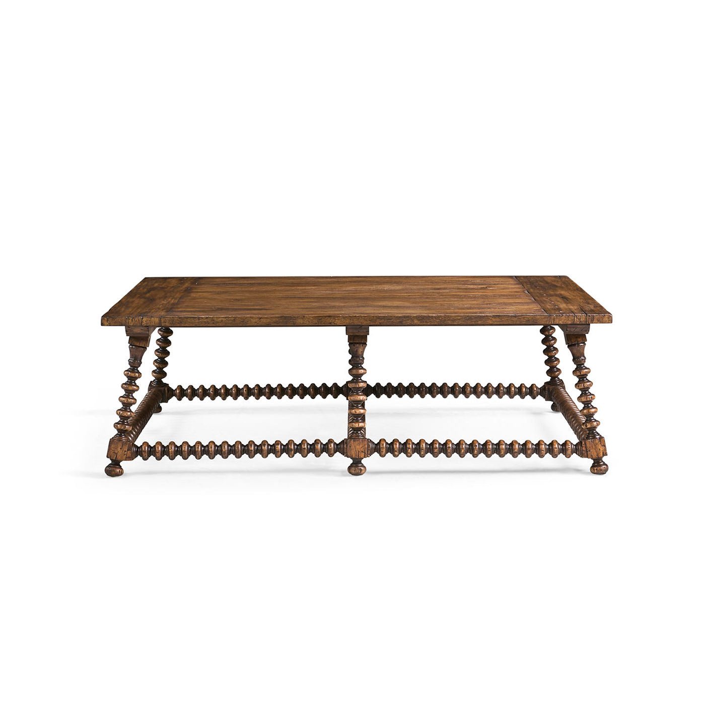 Front view of rustic coffee table with detailed legs.
