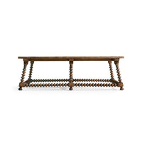 Side view of coffee table showcasing bobbin-turned leg design.
