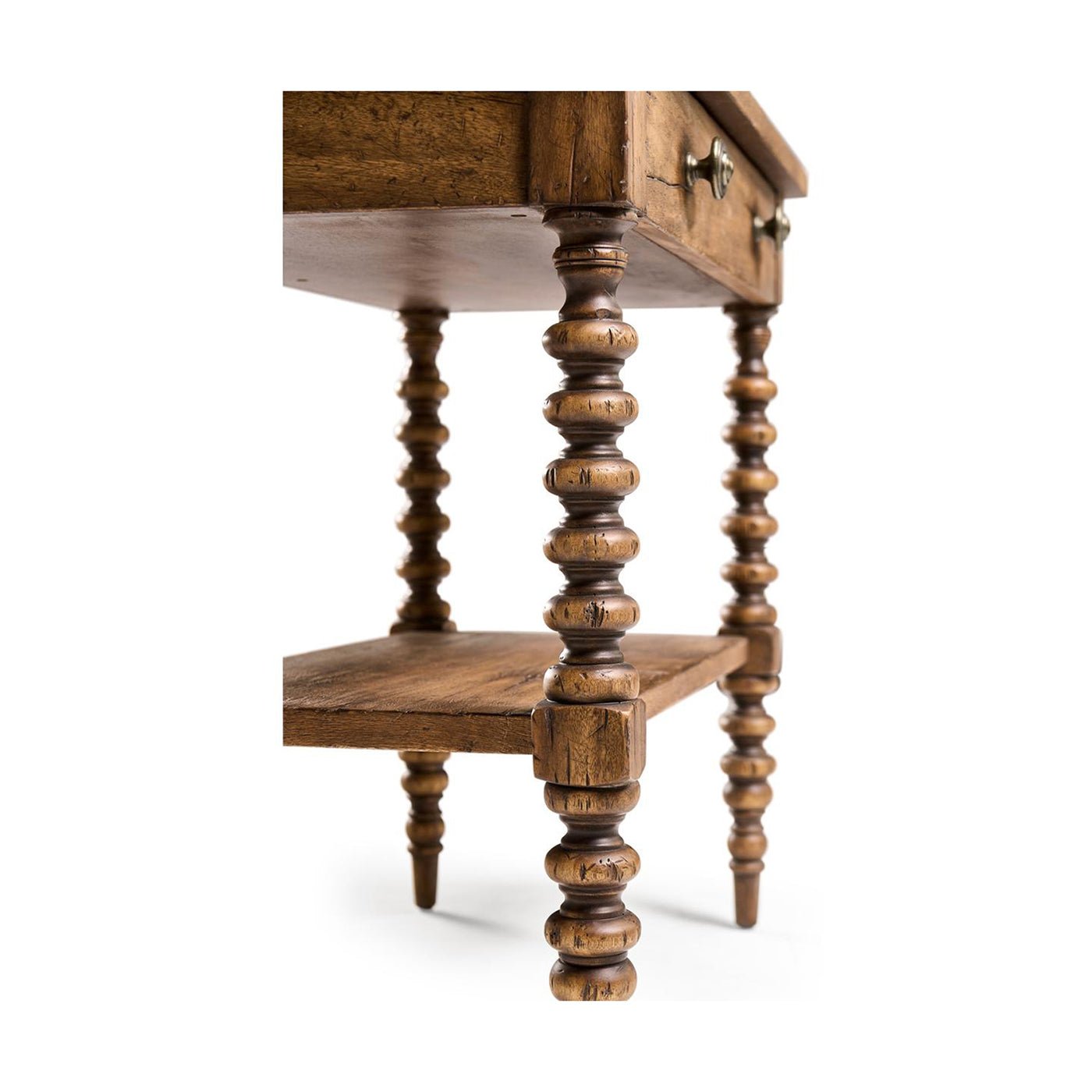 Detailed view of bobbin-turned legs on rustic nightstand.