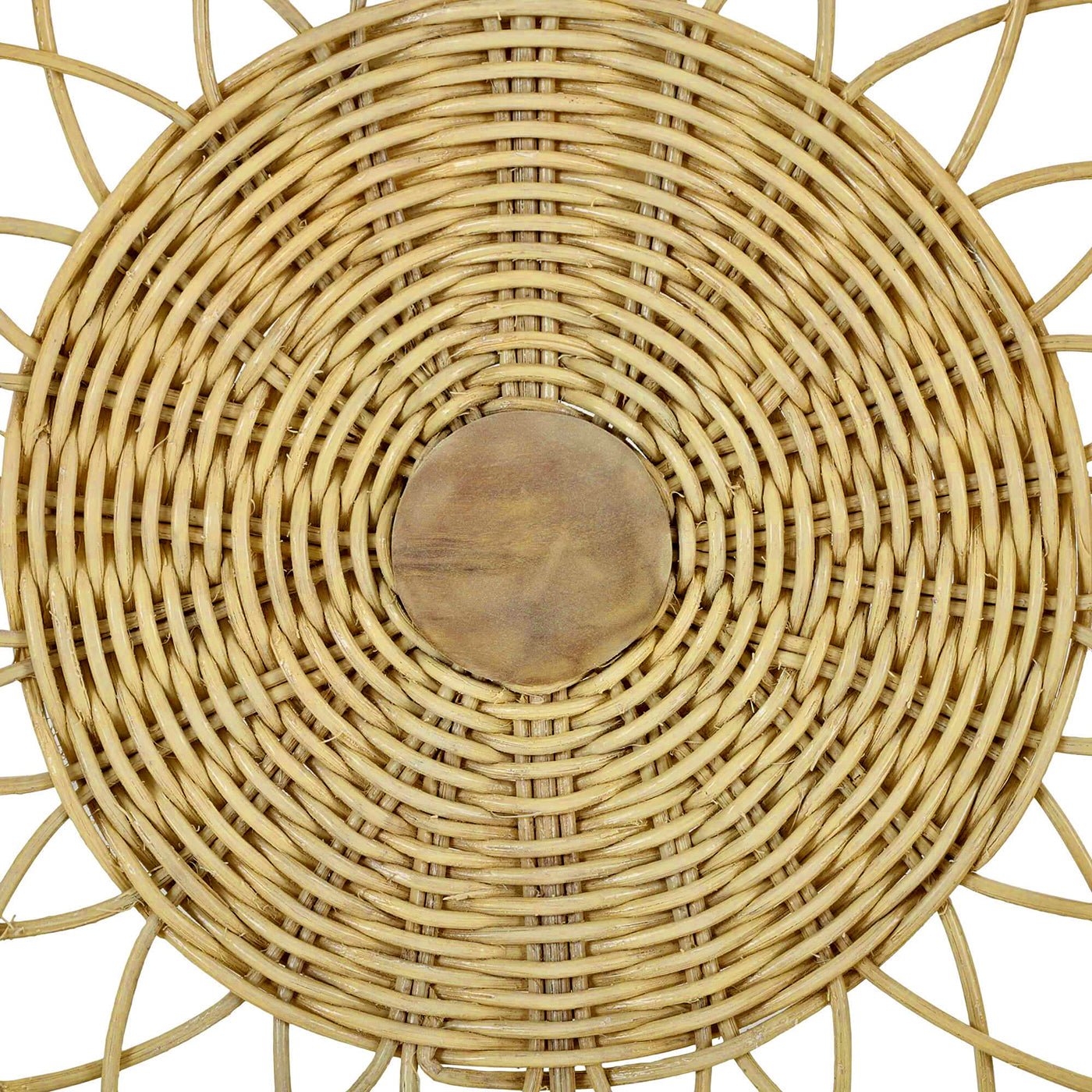 Close-up woven pattern on rattan chair backrest.