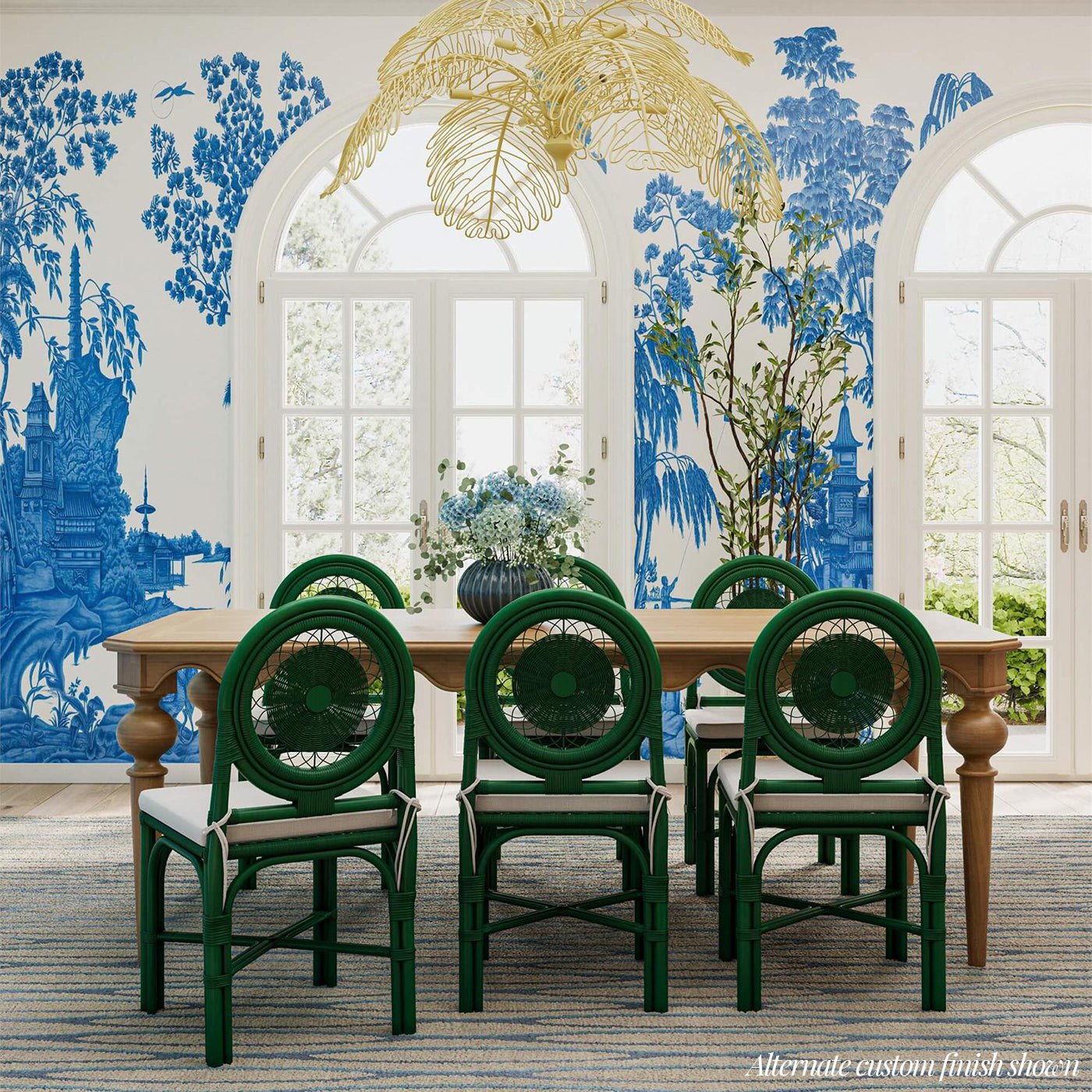 Set of green rattan chairs in stylish dining room.