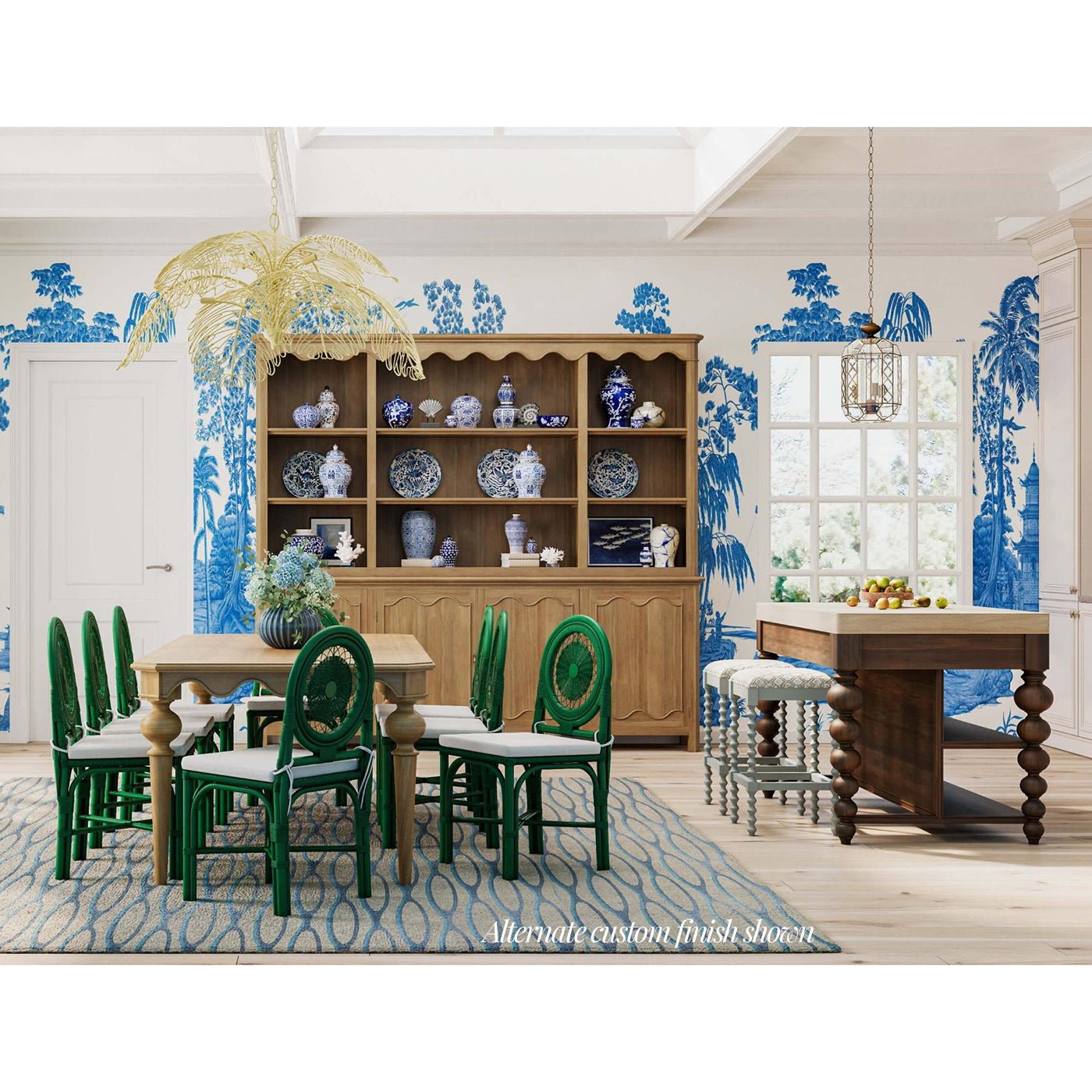 Dining room with green rattan chairs around table.