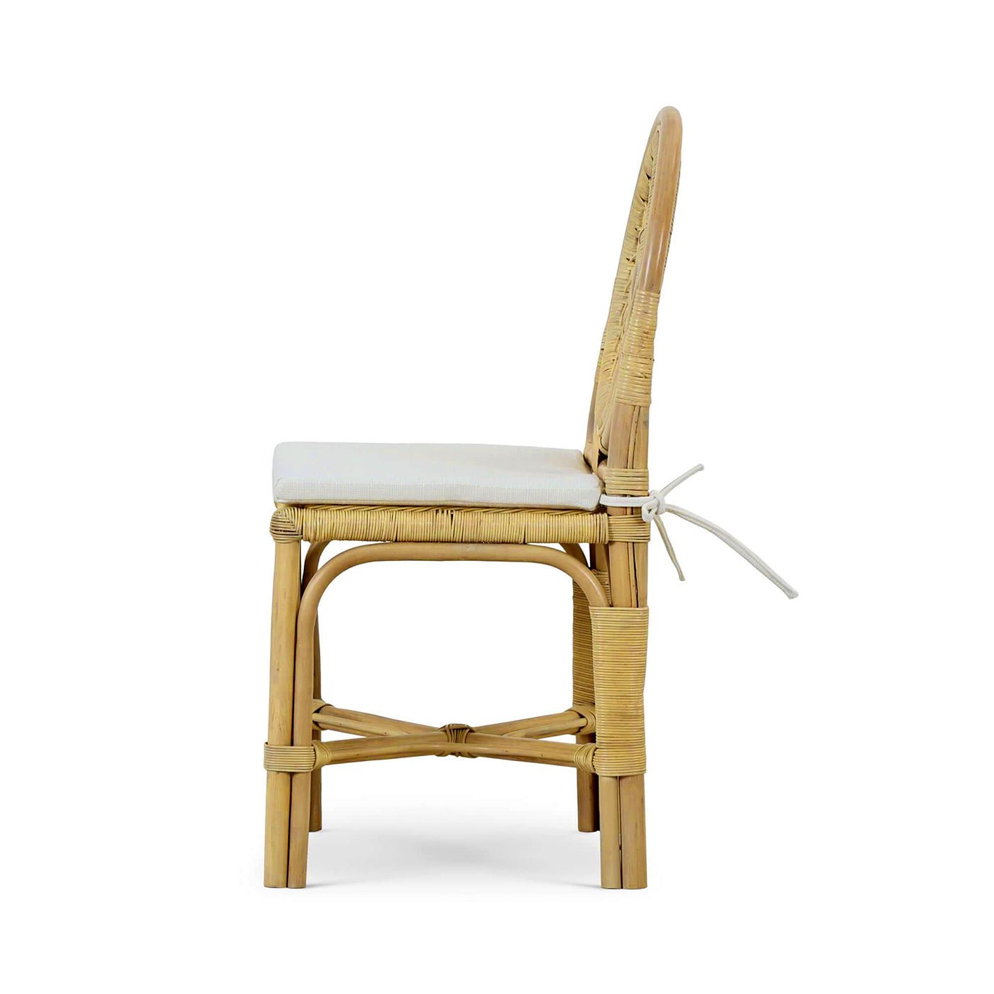 Rattan side chair side profile with cushion.