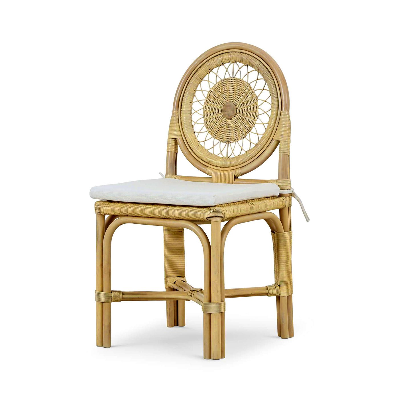 Rattan side chair diagonal view with cushion.