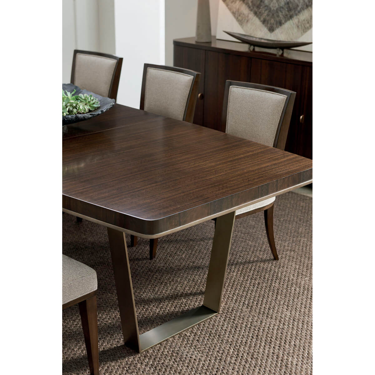 Close-up of dining table with chairs in room.