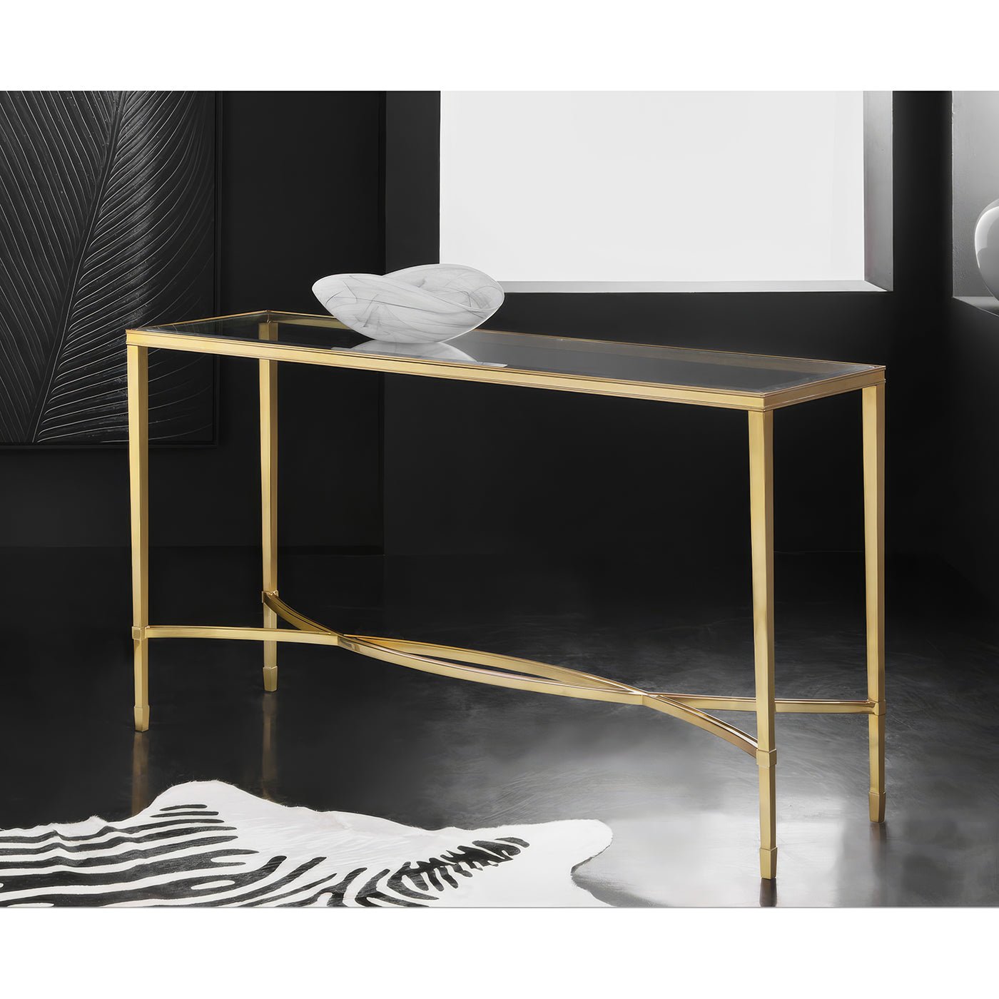Brass mid-century console table in stylish room setting.