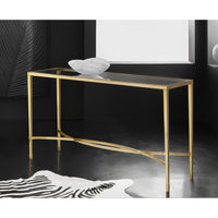 Brass mid-century console table in stylish room setting.