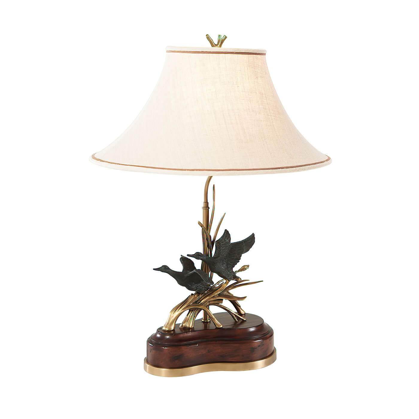 Elegant brass duck table lamp with fabric shade.