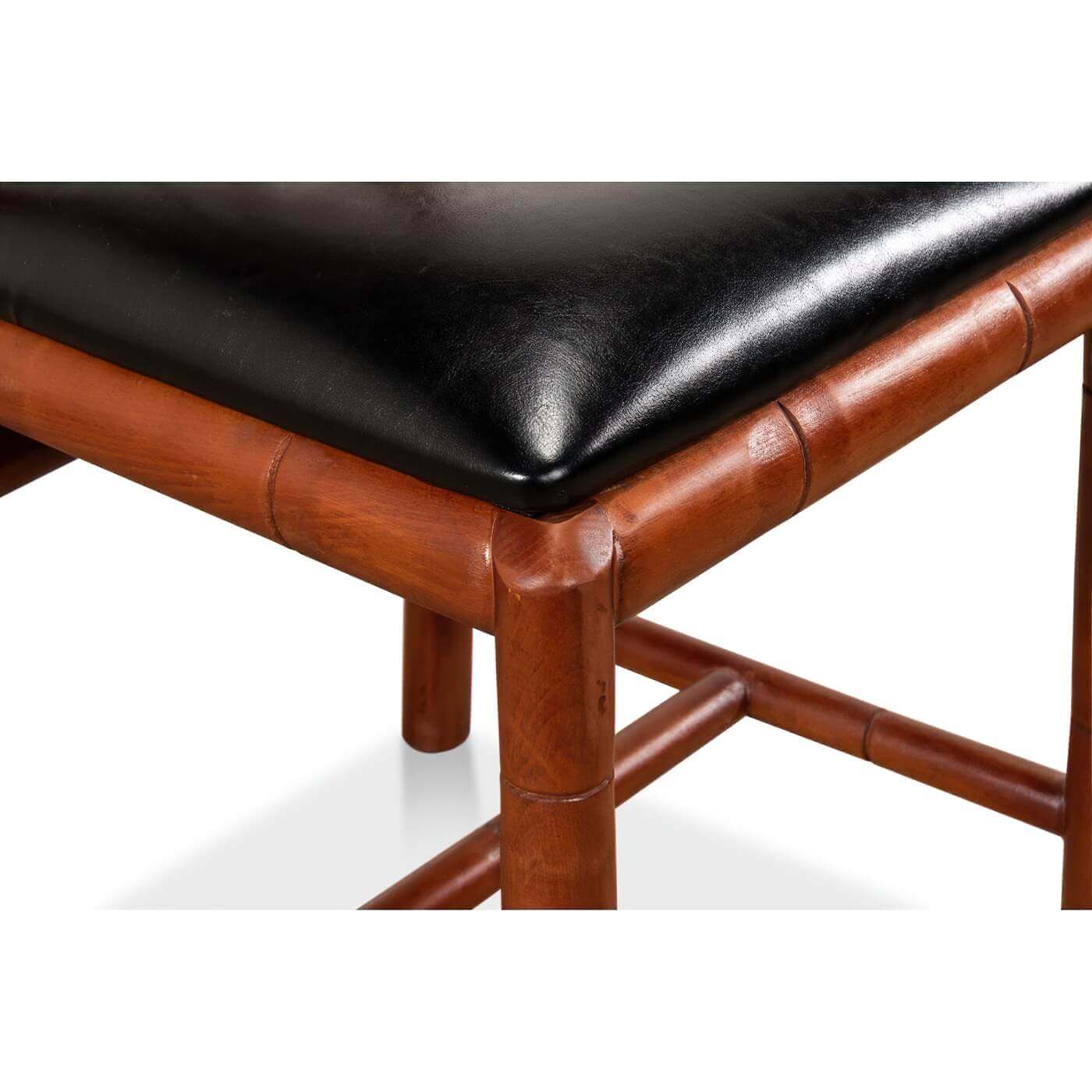 Close-up of faux bamboo chair, seat corner detail.