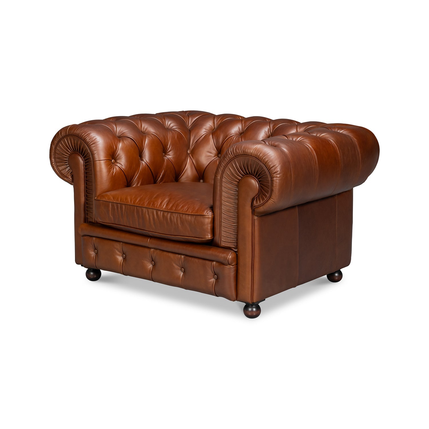 Brown leather Chesterfield armchair, angle view, tufted design