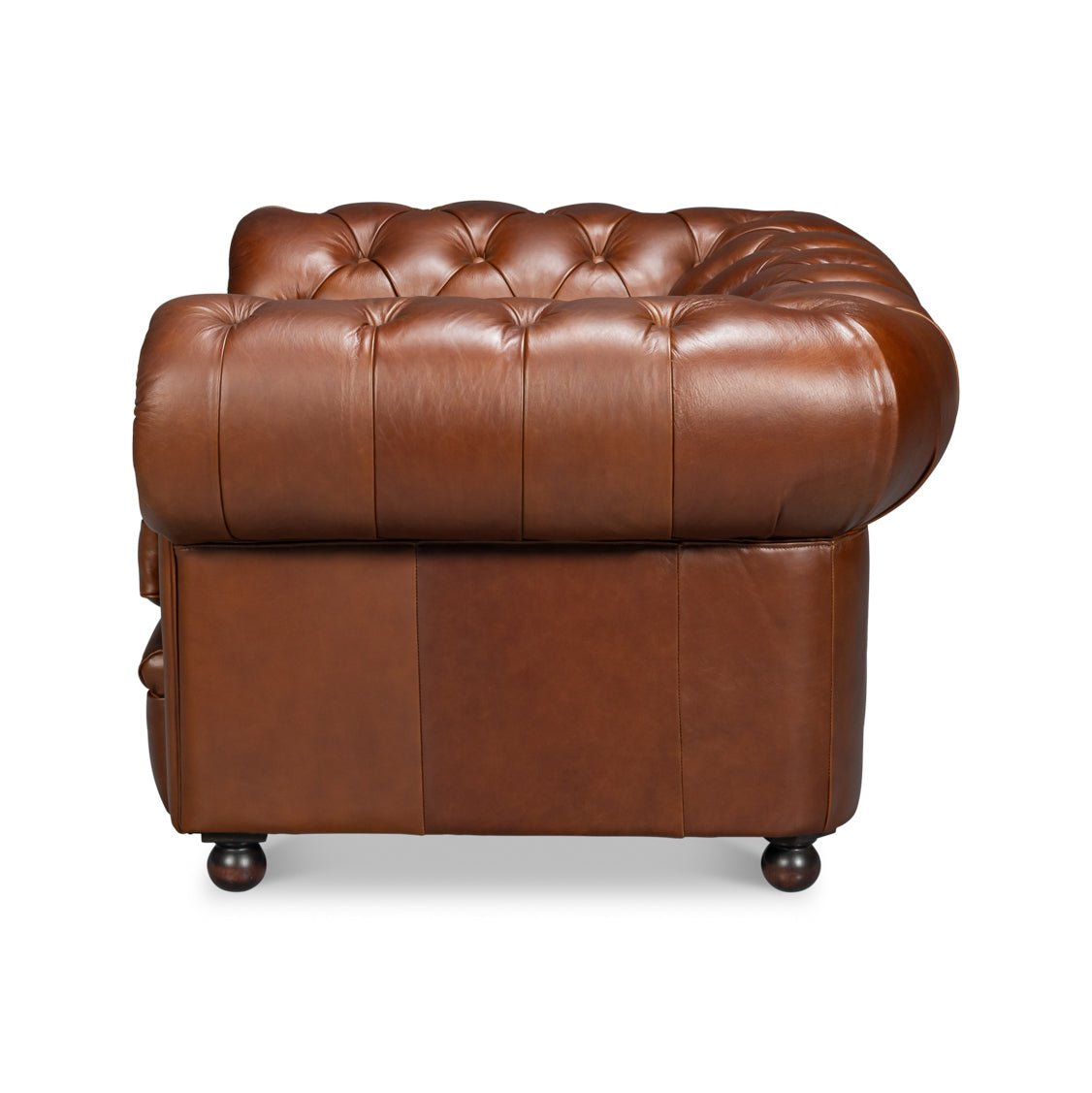 Side view, Chesterfield armchair, rich brown leather, tufted