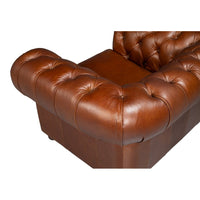 Overhead view, armchair corner, Chesterfield's tufted leather design