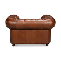 Back view, tufted brown leather Chesterfield armchair