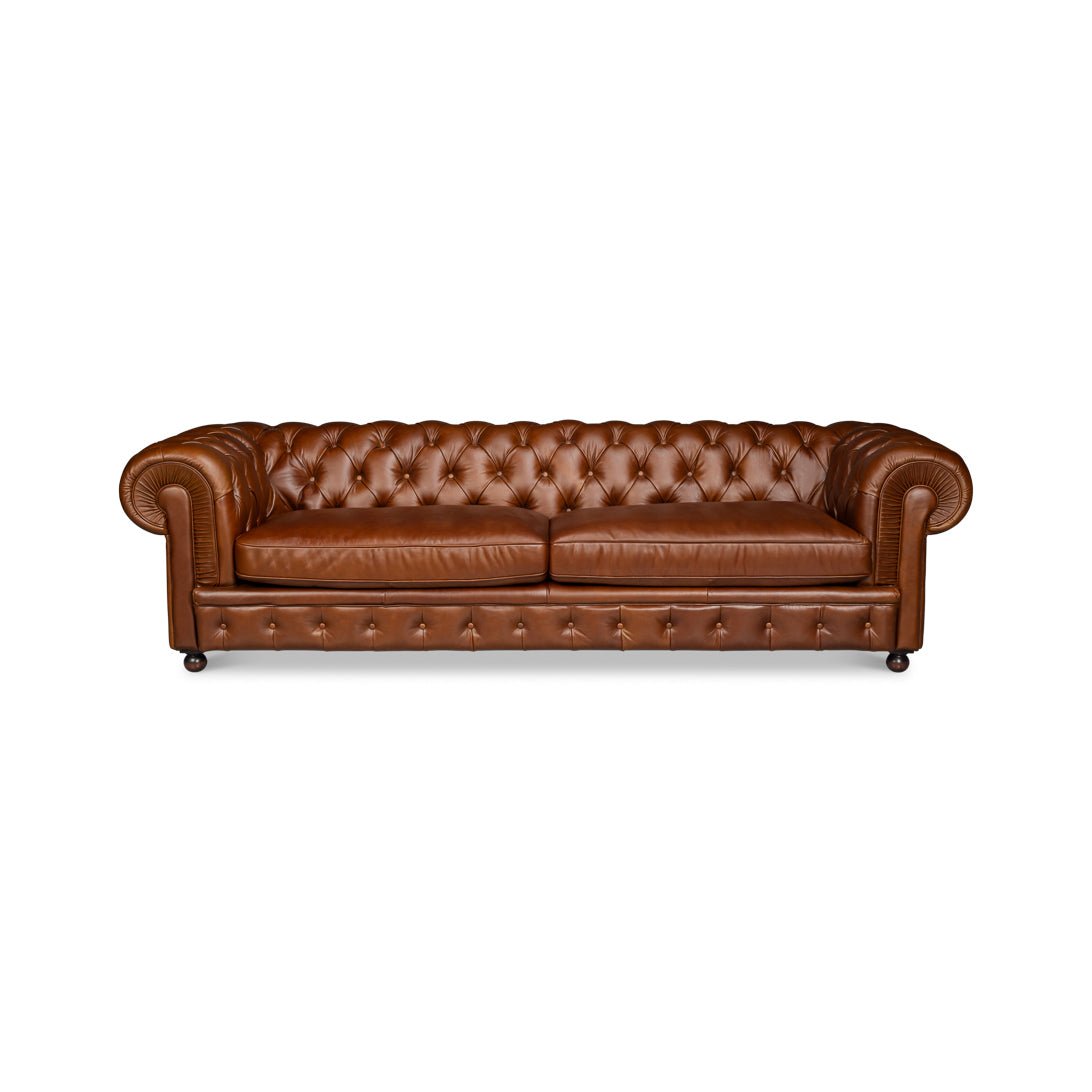 Chesterfield sofa, straight front view, tufted leather upholstery.