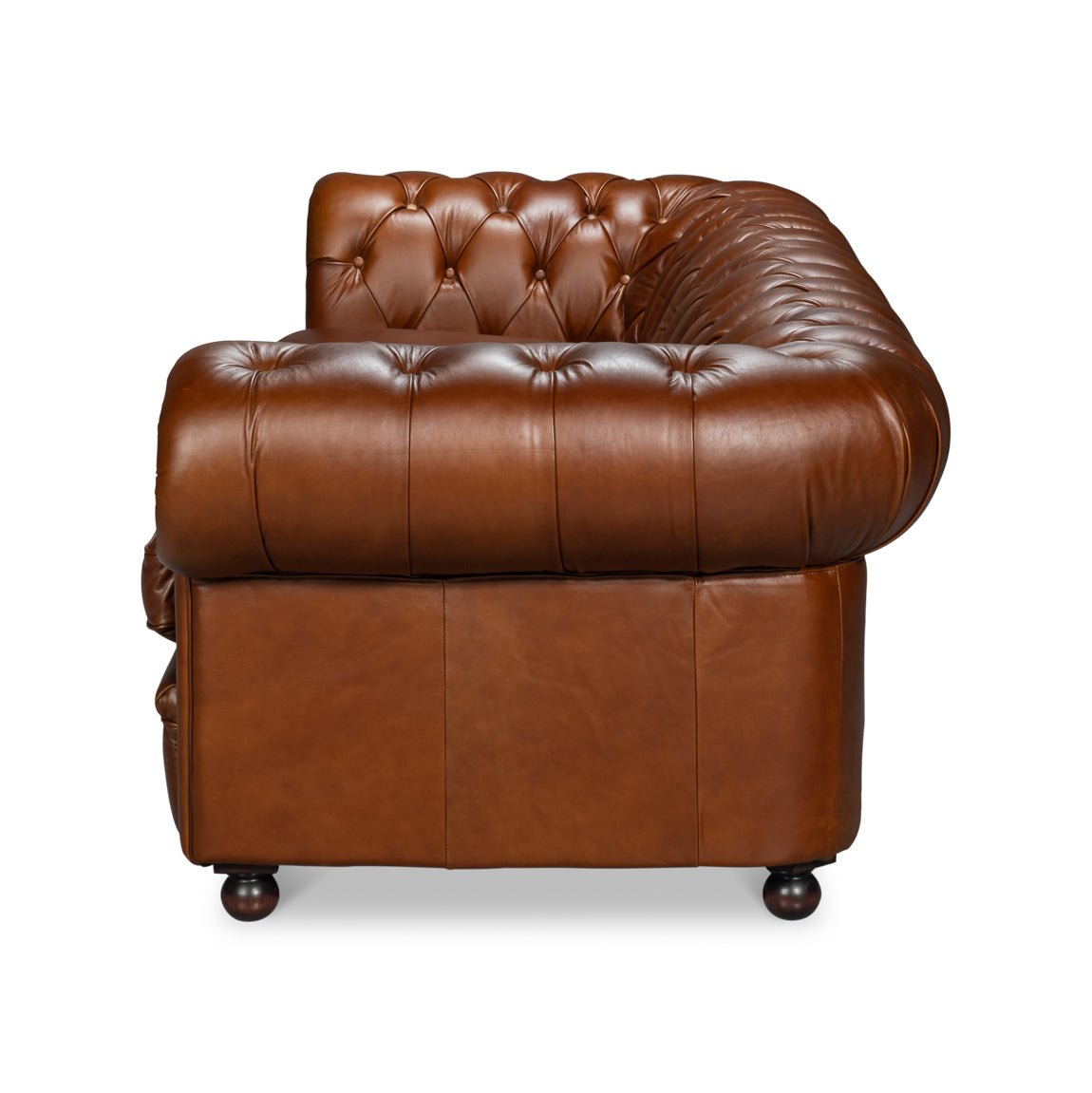 Chesterfield sofa, side view, detailed leather armrest.