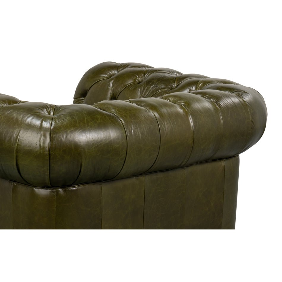 Close-up, arm and backrest detail, green leather.