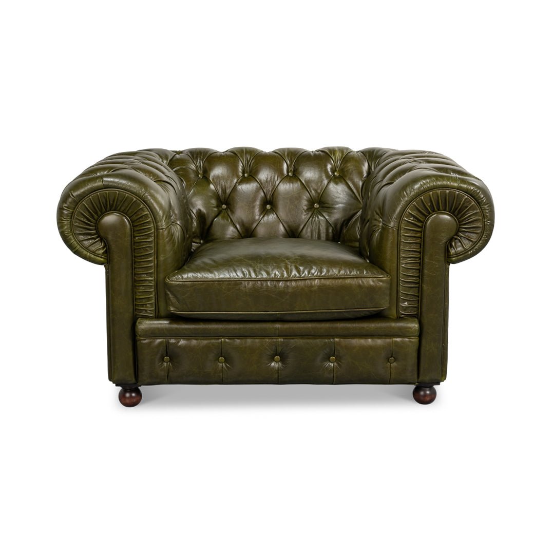Green leather armchair, front view, rolled arms detailed.