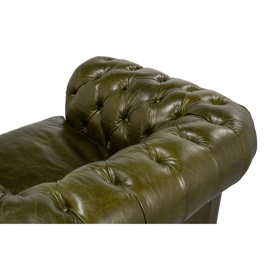 Close-up, top view of armrest, tufted stitching.