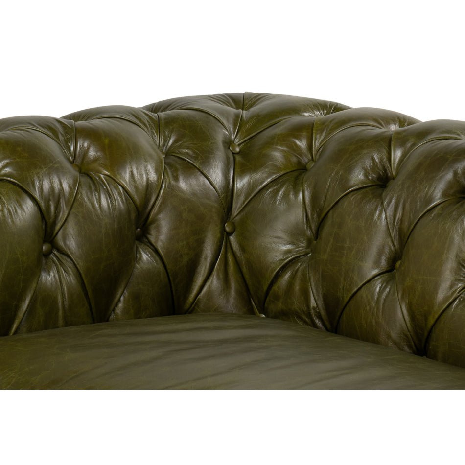 Button-tufting detail in corner of Chesterfield sofa.