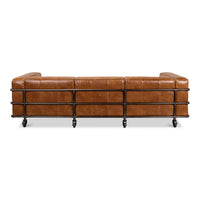 Back view of industrial leather sofa with piping.