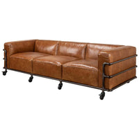 Industrial leather sofa angled view with casters.