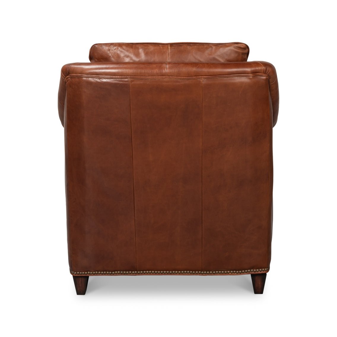 Back view of brown leather accent chair with stitching.