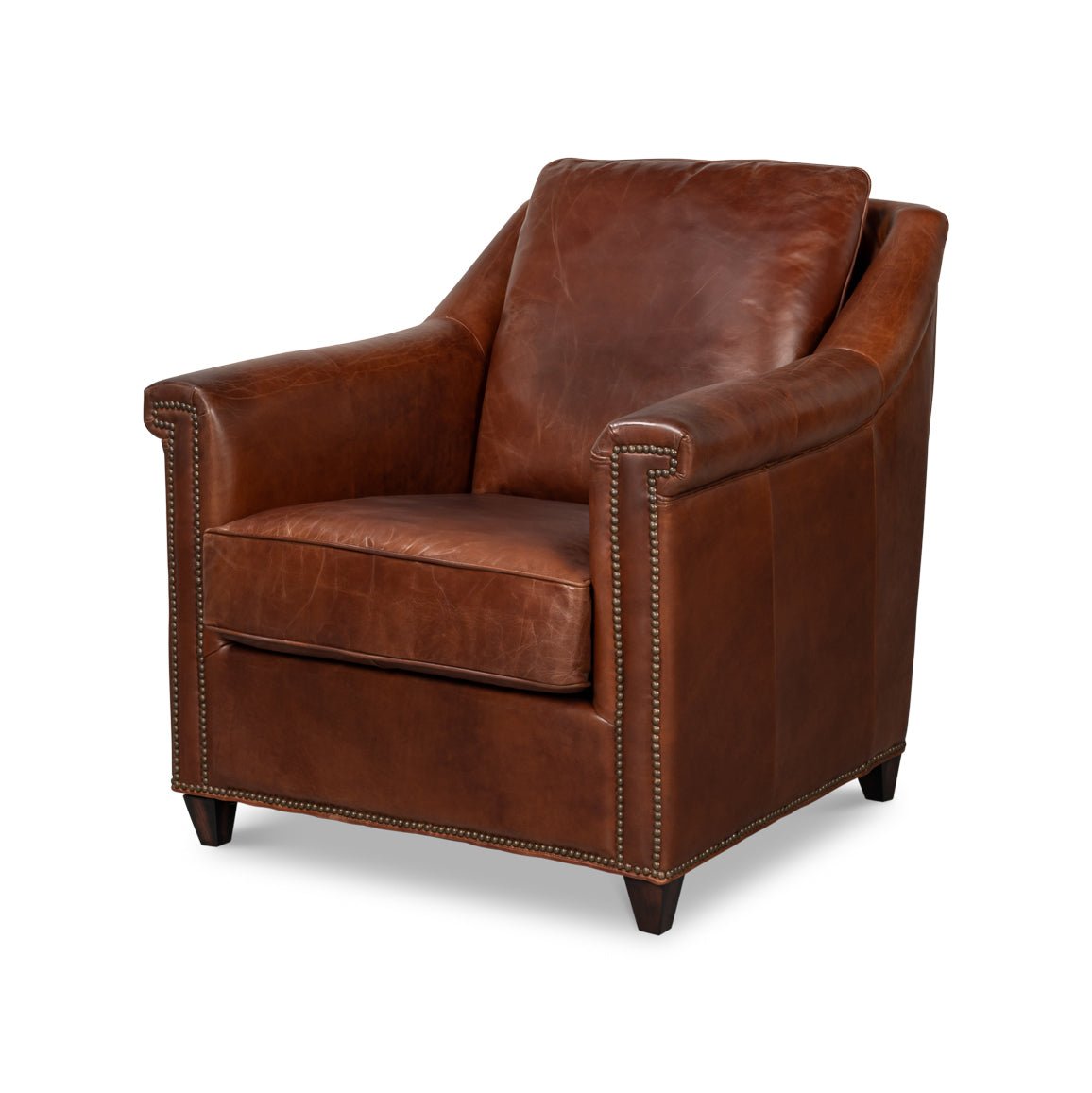Brown leather accent chair angled view with nailhead trim.