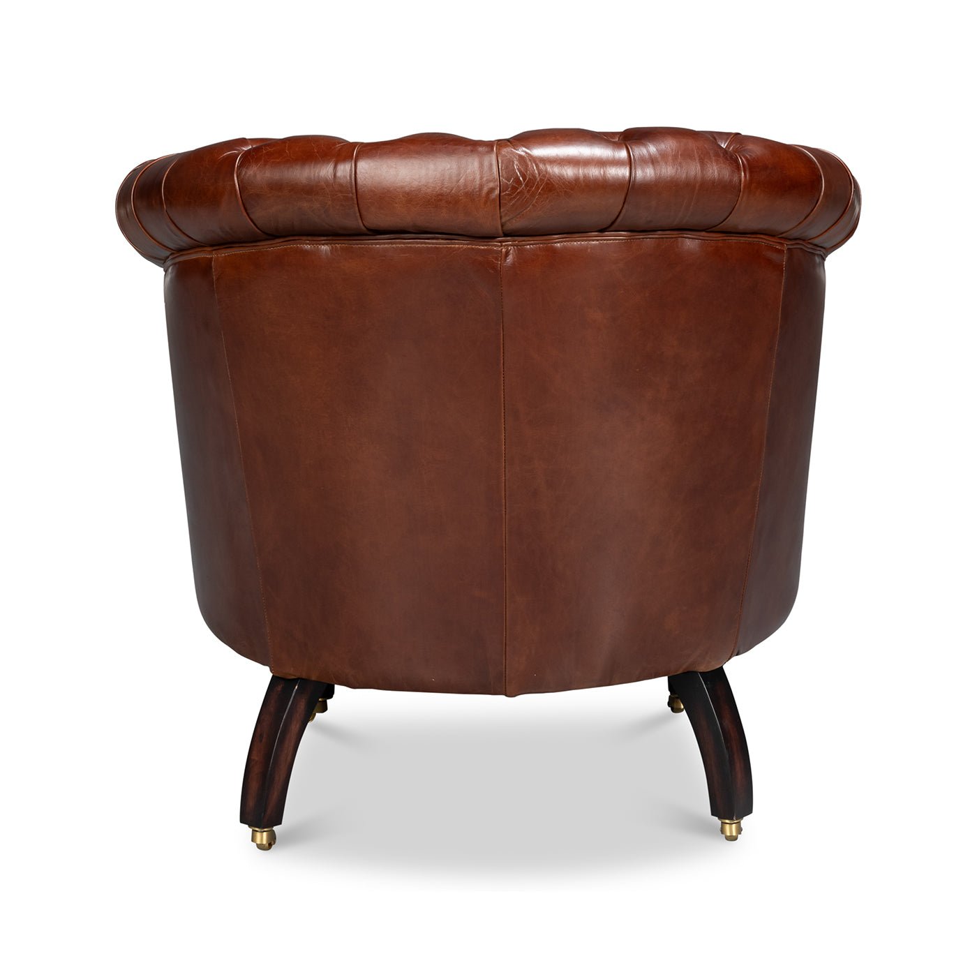 Brown leather barrel chair, rear view.