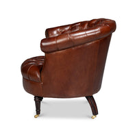 Brown leather barrel chair, side profile.