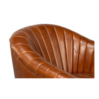 Top view of backrest tufting on leather chair.