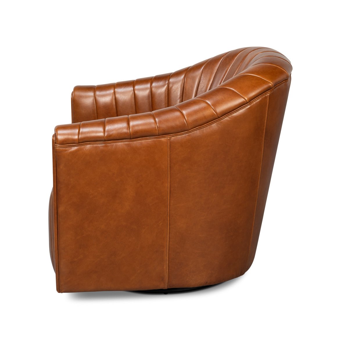 Side profile of tufted brown swivel chair.
