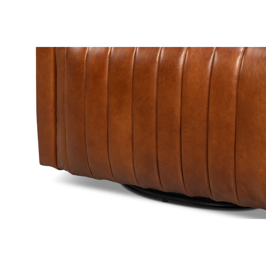 Base and lower section of brown leather swivel chair.