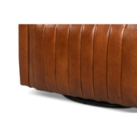 Base and lower section of brown leather swivel chair.