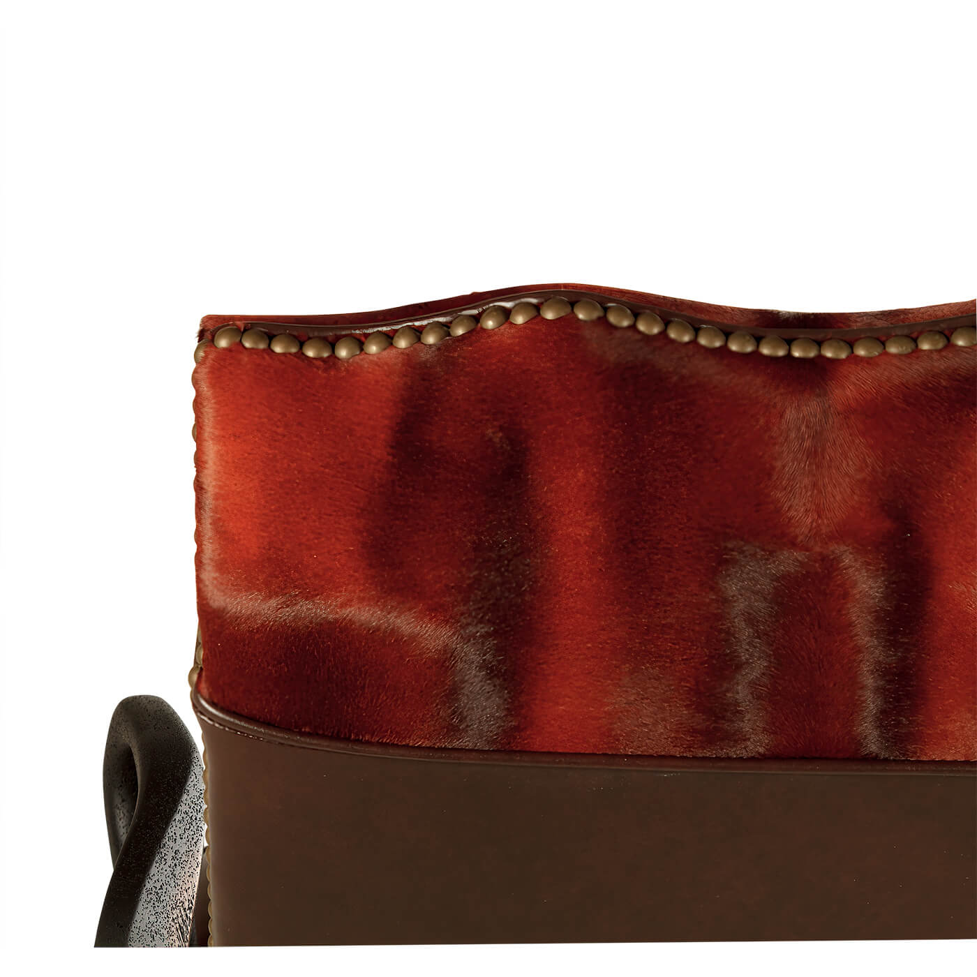 Backrest detail, red-brown leather, studded trim design.