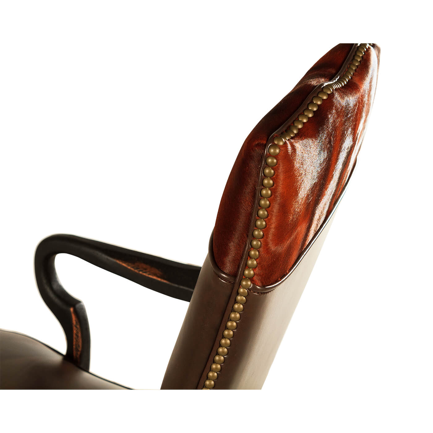 Close-up, chair headrest, studs and leather texture.