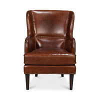Brown leather wing chair, direct front view.