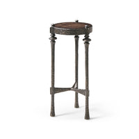 Front view of iron and wood round accent table.