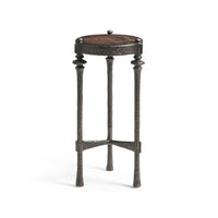Side angle of wood top accent table, three legs.