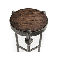 Top view of wooden surface on round accent table.